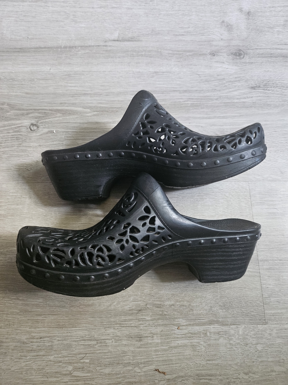 Dansko Black Laser-Cut Slip-On Clogs